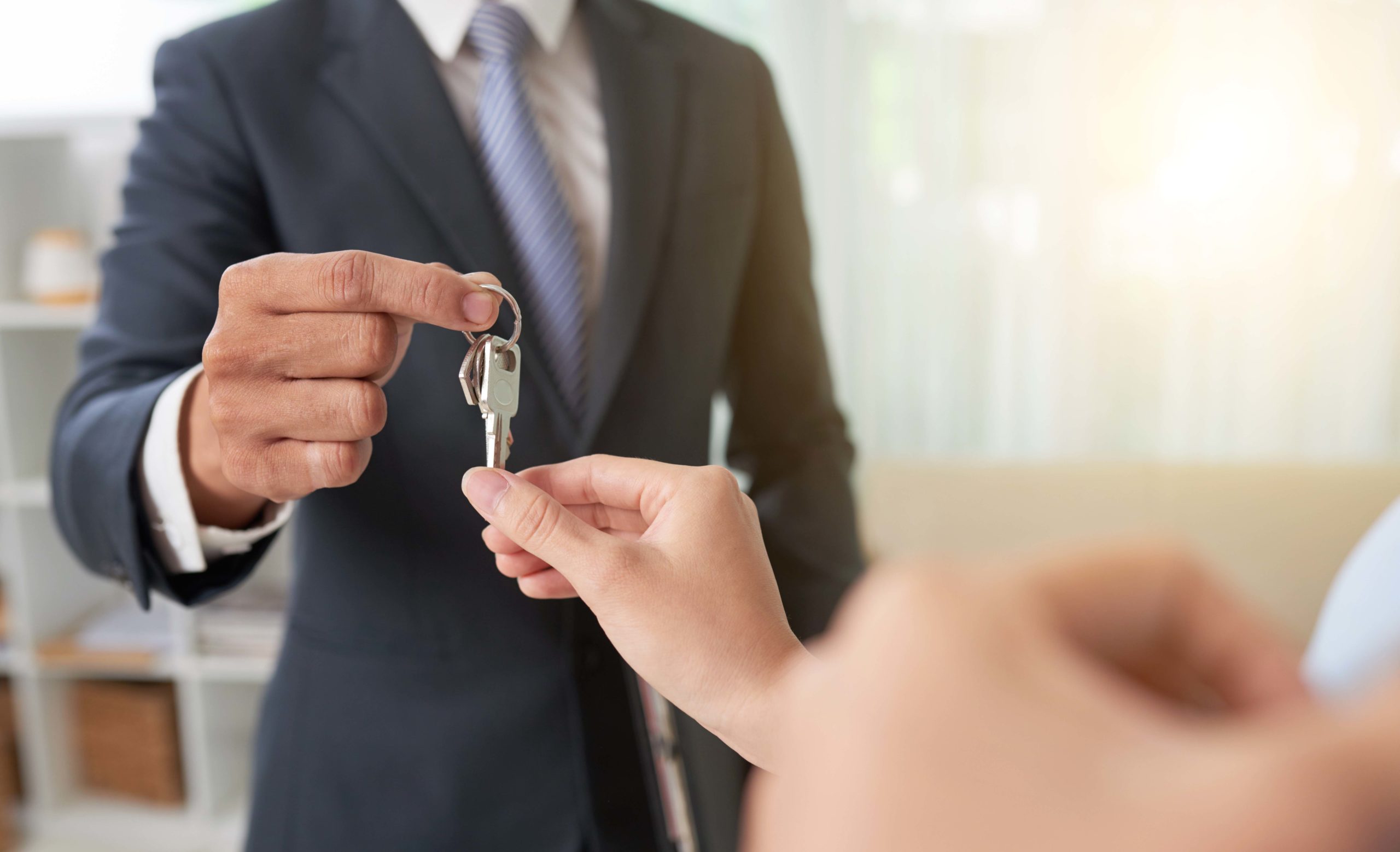 Broker giving keys