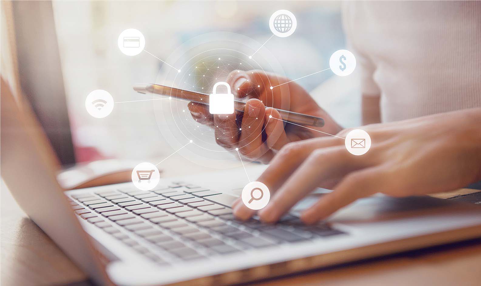 Woman using smartphone and laptop with icon graphic Cyber securi